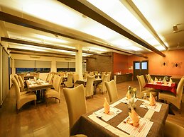 Capital O 15754 Mookkannoor Tourist Home