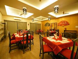 Capital O 15754 Mookkannoor Tourist Home