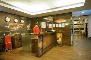 Capital O 15754 Mookkannoor Tourist Home