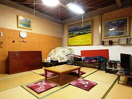 Guesthouse Tomoshibi - Hostel