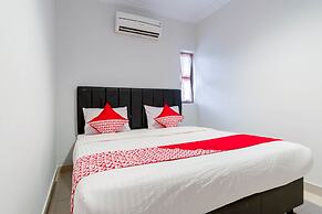 Super OYO 283 Helvetia Residence