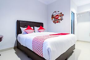 Super OYO 283 Helvetia Residence