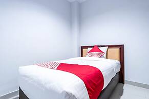 Super OYO 283 Helvetia Residence