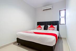 Super OYO 283 Helvetia Residence