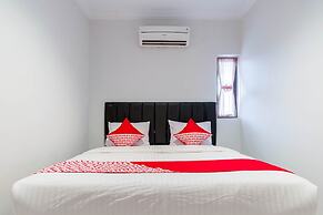 Super OYO 283 Helvetia Residence