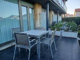 Apartamentos Playa de Portio