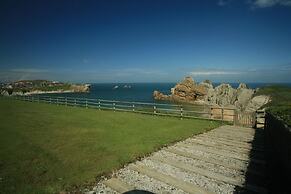 Apartamentos Playa de Portio