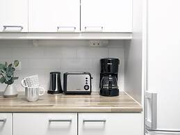 2ndhomes ESPA Apartment with Sauna and Balcony