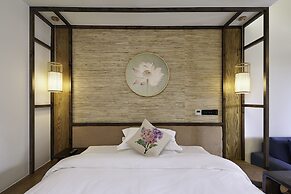 Floral Hotel Deqing Qinzizaiju