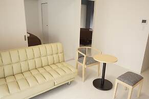 Mr.KINJO inn in front of Children Medical Care Center