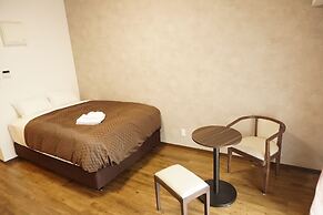 Mr.KINJO inn in front of Children Medical Care Center