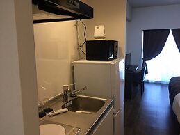 Mr.KINJO inn in front of Children Medical Care Center