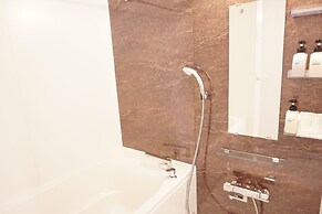 Mr.KINJO inn in front of Children Medical Care Center