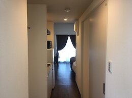 Mr.KINJO inn in front of Children Medical Care Center