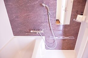 Mr.KINJO inn in front of Children Medical Care Center