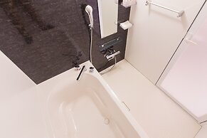 Mr.KINJO inn in front of Children Medical Care Center