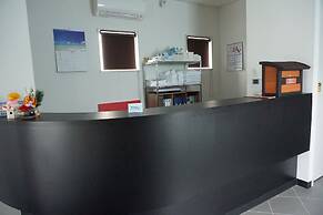 Mr.KINJO inn in front of Children Medical Care Center