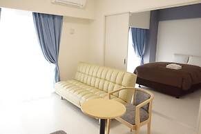 Mr.KINJO inn in front of Children Medical Care Center