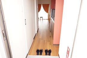 Mr.KINJO inn in front of Children Medical Care Center