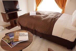 Mr.KINJO inn in front of Children Medical Care Center