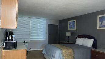 Apm Inn & Suites