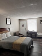 Apm Inn & Suites