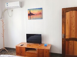 Taining Happy Stone Duplex Apartment