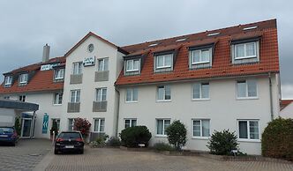 Check Inn Hotel