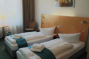 Check Inn Hotel