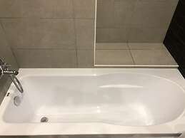 Apartment on Kamyshovaya St. 41, apt 10