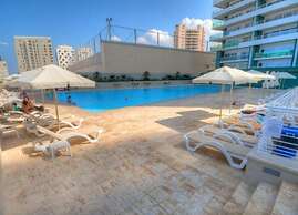 Luxury Apt With Side Seaviews and Pool, Best Location