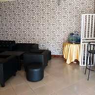 Happy Wallet Gardens Hotel