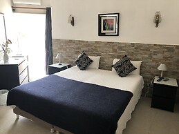 Quartos e Apartamentos Atalaia