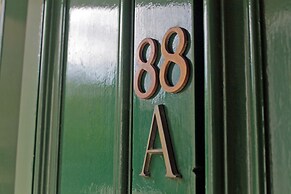 Silver Lining - Gilmore Place Apartment