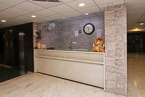 OYO 26911 Kcg Hotels