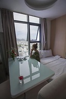 Ideal Time Apartment