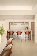 Anfitrión Villas & Suites