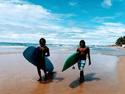 Malika's Yellow House