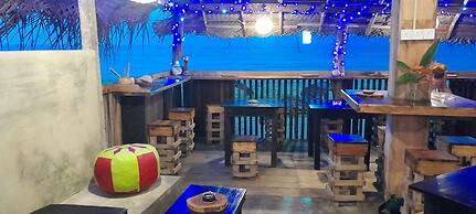 Malika's Yellow House