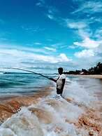 Malika's Yellow House