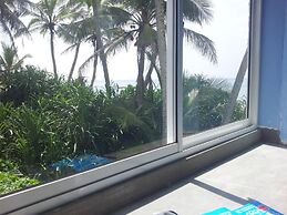 Malika's Yellow House