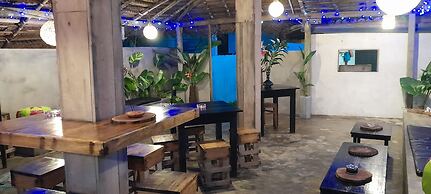 Malika's Yellow House