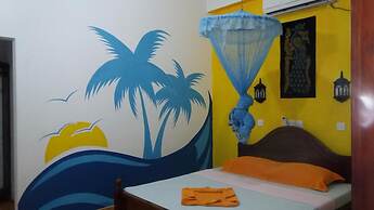 Malika's Yellow House