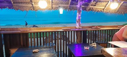 Malika's Yellow House