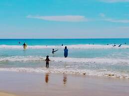 Malika's Yellow House