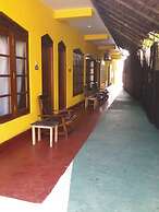 Malika's Yellow House