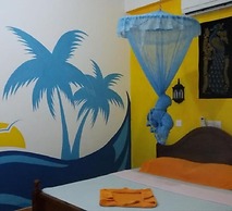 Malika's Yellow House