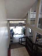 Ekonumi Rooms at Benrosi Plaza