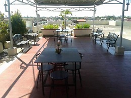 Ekonumi Rooms at Benrosi Plaza