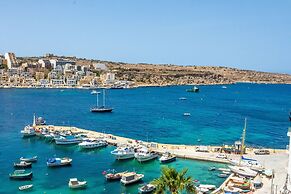 Harbour Lights Seafront Penthouse by Getaways Malta